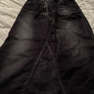 Black velveteen calve length jean skirt, purchased in Spain.